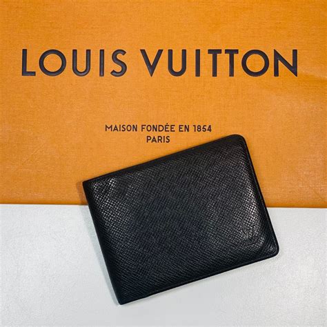 portafoglio louis vuitton made in spain|portafoglio louis vuitton uomo.